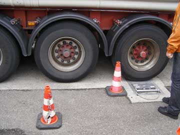 Photo of truck wheels on a static weighing device at a mobile enforcement site in the Netherlands.