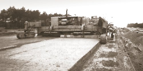 Photo of slipform paving in Belgium from the 1970s.