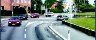 Small roundabout flush with pavement, Sweden