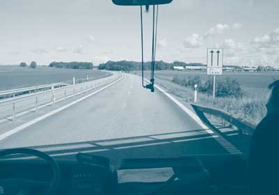 Note the cable barrier and sign indicating the length of the passing lane