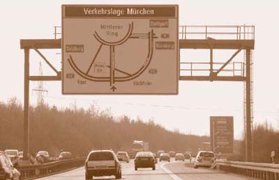 Photo of an overhead changeable message sign with congestion indication.