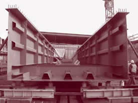 Incremental launching with precast concrete decks