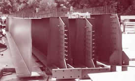 Partial-depth concrete deck prefabricated on steel beams