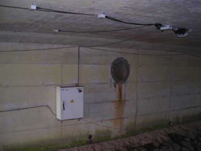 Photo of a WIM system installed underneath a bridge in Slovenia.