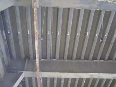 Photo of a WIM system installed underneath a bridge at a test site in France.