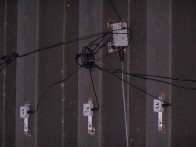 Photo of a WIM system installed underneath a bridge at a test site in France.