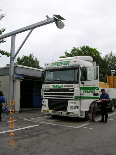 Photo taken from the front of a truck being measured by a vehicle profiler system in Switzerland.