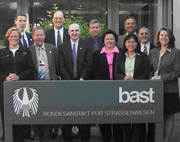 Photo of scan team members standing behind BASt sign in Bergisch-Gladbach, Germany.