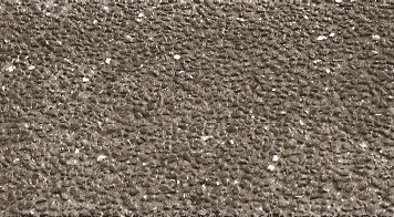 Photo of exposed aggregate surface on Austrian concrete pavement.