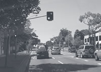 Photo of protected right-turn signals in dedicated right-turn lanes.