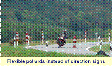 Figure 8. Photo of motorcyclist on a road curve with flexible post delineators.