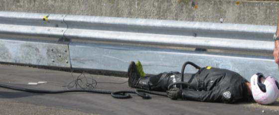 Figure 14. Photo of motorcycle barrier and crash test dummy.